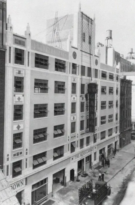 Historic multi-story building on a city street.